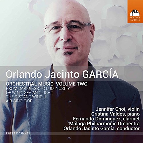 CD cover featuring a bald man in a dark jacket against a white background.