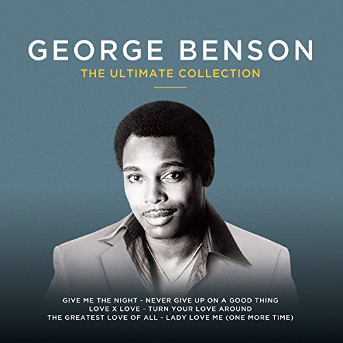 "CD cover with black and white photo of George Benson on blue background."