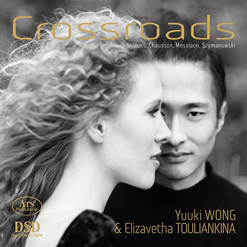 CD cover featuring a woman and man in a close embrace, black and white.