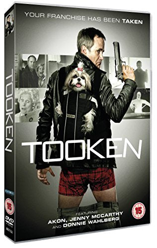 DVD case for "Tooken" with man holding gun and dog, against a gray background.
