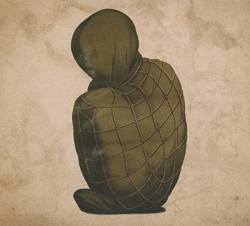 Figure in a hooded robe and netting, seen from behind.