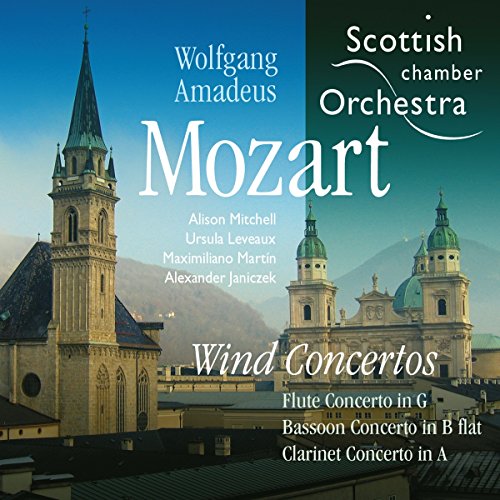 "CD cover with church towers and mountains, featuring Mozart's Wind Concertos by Scottish Chamber Orchestra."