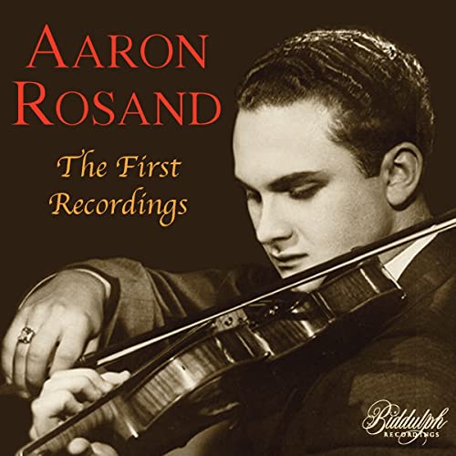 Black and white portrait of violinist Aaron Rosand with his instrument.