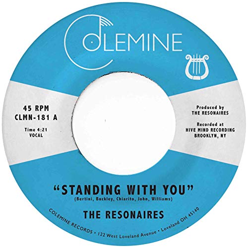 Blue and white 45 RPM vinyl record label with text and musical symbols.