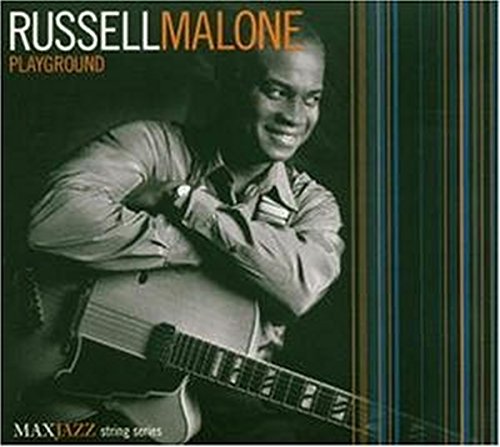 "Album cover featuring a man with a guitar on a dark background with stripes."