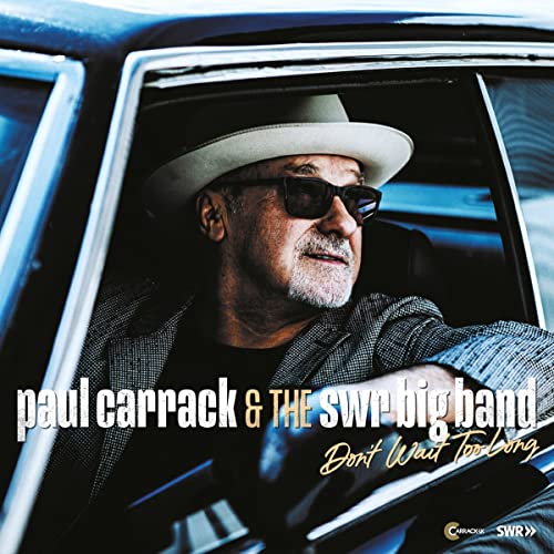 Paul Carrack in a hat and sunglasses, album cover for "Don't Wait Too Long".