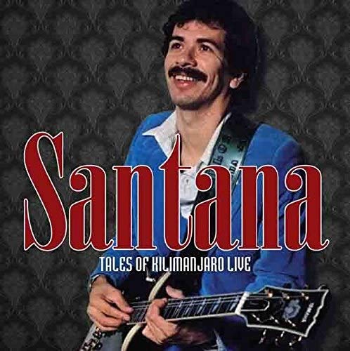 Carlos Santana with guitar, album cover for “Tales of Kilimanjaro Live”.