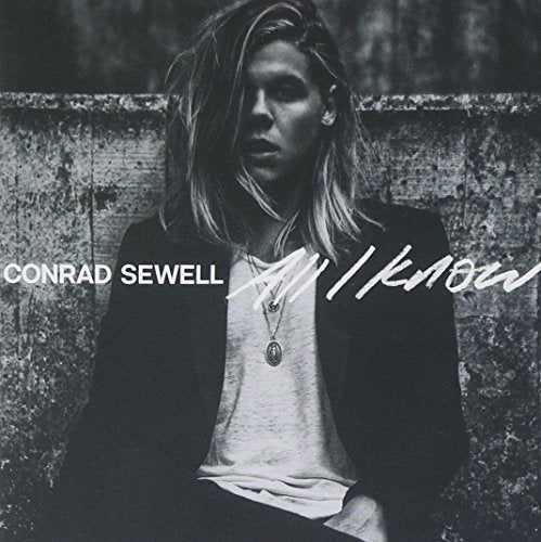 Black and white album cover featuring singer Conrad Sewell.
