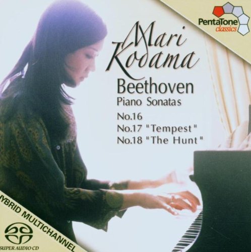 Mari Kodama playing piano on a CD cover with text and logos.
