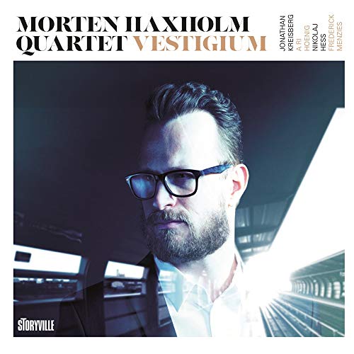 CD cover featuring a portrait of a man with glasses and beard.