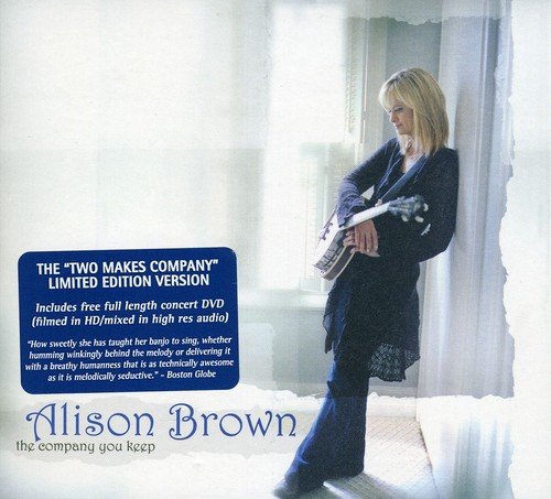 "Album cover with a blonde woman holding a banjo, standing by a window."