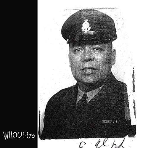 Black and white portrait of a man in a military uniform and cap.