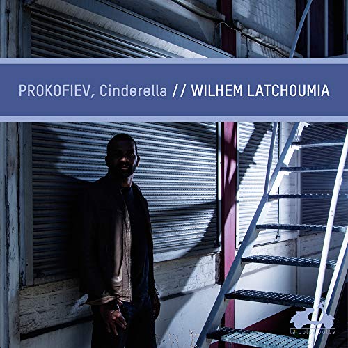 CD cover featuring a man in front of metal shutters and stairs.