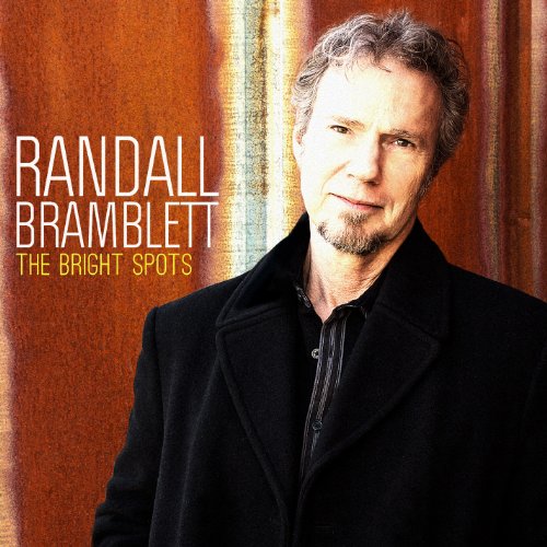 CD cover featuring Randall Bramblett in a black jacket against a red curtain background.