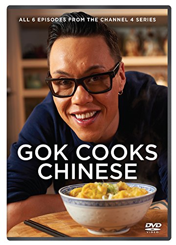 Gok Wan smiling behind a bowl of food on the Gok Cooks Chinese DVD cover.