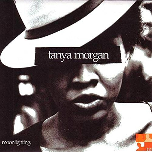 Close-up of a person in a hat, album cover for "Moonlighting.