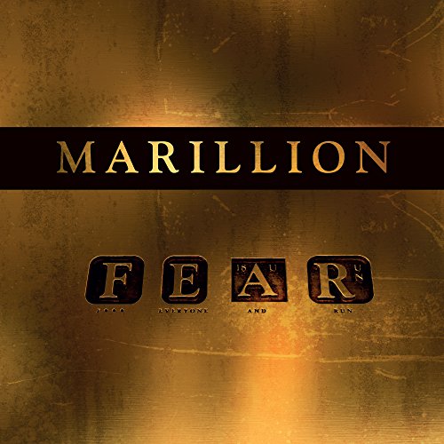 The alt text for the image is: "Gold textured album cover with 'F E A R' in gold letters."