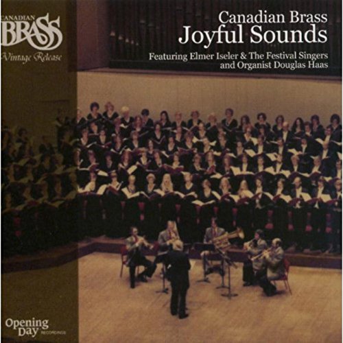 Canadian Brass CD cover with choir and brass quintet on stage, brown accents.