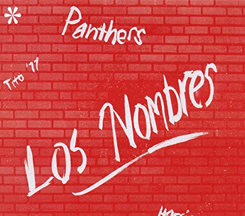 CD cover with red brick wall background and white painted text.