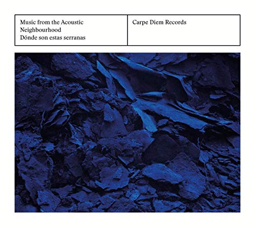 "CD cover with blue-toned rocky image and text on white background."