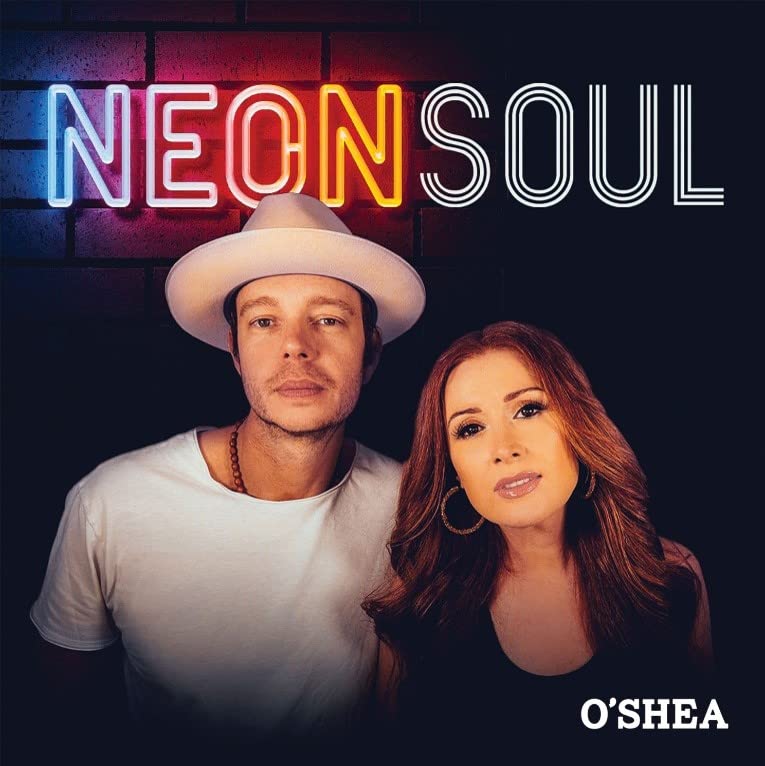 “Neon Soul” CD cover featuring a man and woman with neon lettering.