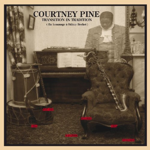 "Album cover with a man standing near an armchair holding a bassoon."
