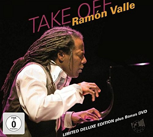 CD cover featuring a man with long braids playing piano, against a black background.
