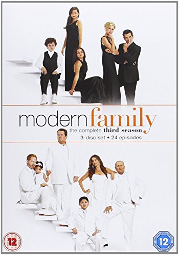 "Modern Family Season 3 DVD cover featuring main characters in formal attire."