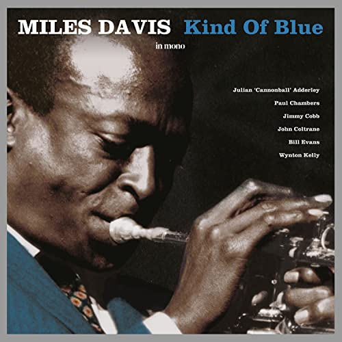 Miles Davis playing trumpet on the cover of the "Kind Of Blue" vinyl album.