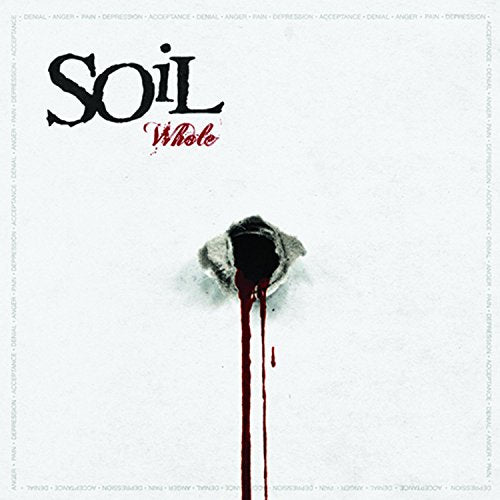 Album cover for Soil’s “Whole” featuring a hand with dripping red liquid.