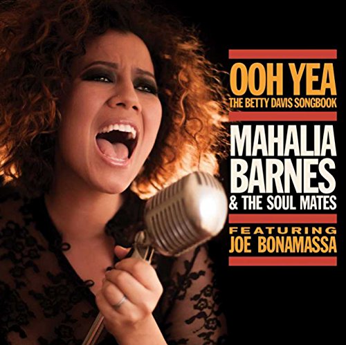 CD cover featuring a woman singing into a vintage microphone.