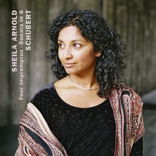 CD cover featuring a woman with curly hair and a shawl.
