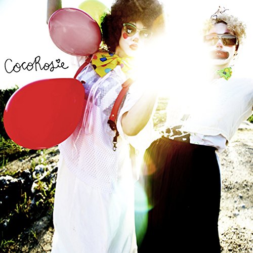 Album cover featuring two women with painted faces and balloons, outdoors in bright light.
