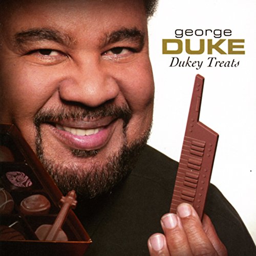 "CD cover featuring George Duke holding a box of chocolates and a chocolate comb."