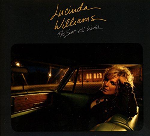 Album cover of "This Sweet Old World" by Lucinda Williams, featuring a woman in a car.
