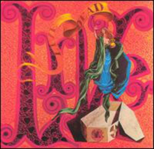 The image is a CD cover for the Grateful Dead's "Live/Dead" album, featuring a woman standing on a cube. For accessibility purposes, a suitable alt text could be: "CD cover art with a woman on a cube."