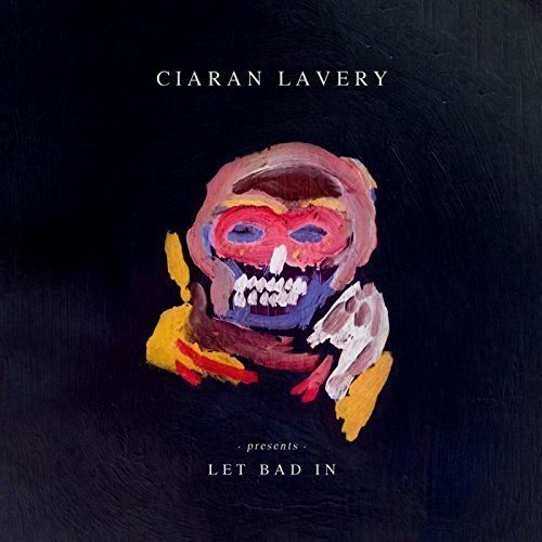 "Vinyl album cover with abstract, colorful skull on a black background, titled 'Let Bad In'."