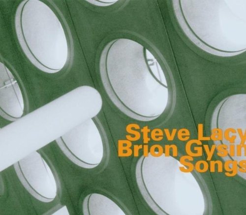 "CD cover with gray background, circular cutouts, and orange text."