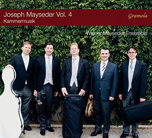 "CD cover featuring five men in suits holding violin cases before a green hedge."