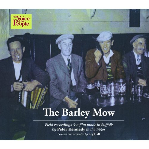 "CD cover with four men at a table, one holding an accordion."