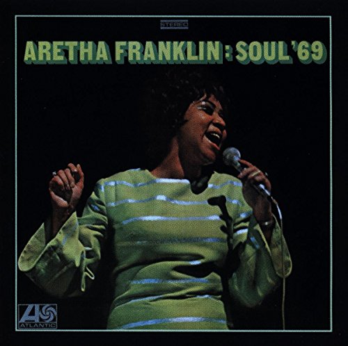 "Aretha Franklin's 'Soul '69' album cover featuring Franklin singing into a microphone."
