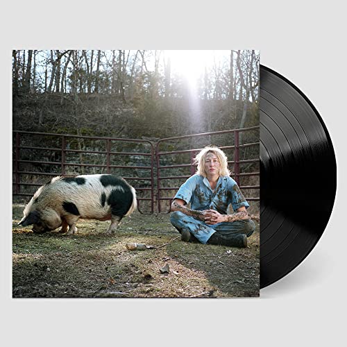 Vinyl record with album cover featuring a person and a pig.