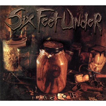 "Album cover with dark, abstract background and 'Six Feet Under' text in stylized font."