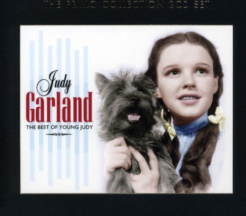 "CD cover featuring Judy Garland holding a dog, with text on a white background."