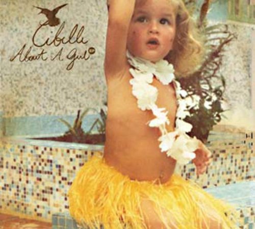 "CD cover featuring a young girl in a hula skirt and flower garland."
