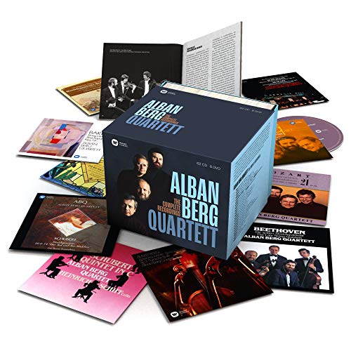 "Dark blue box set with 'Alban Berg Quartett' text, surrounded by CDs and booklets."