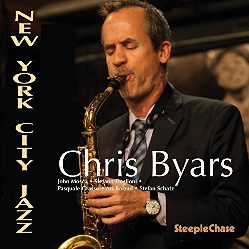 "Album cover featuring a man in a suit playing a saxophone."