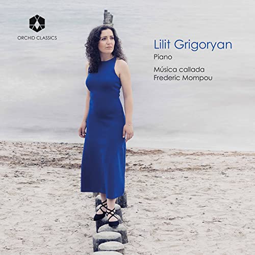 CD cover featuring pianist Lilit Grigoryan in a blue dress, beach background.