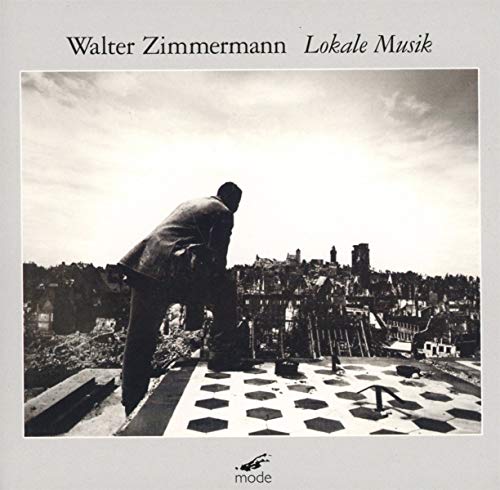 CD cover: man on rooftop overlooking a town, black and white.