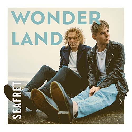 Album cover for Seafret’s “Wonderland” featuring two young men seated outdoors.